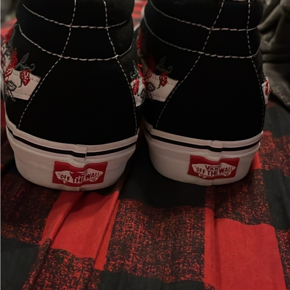 Vans Black and White High-Tops with Red Accents